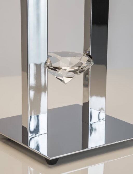 Combining mesmerizing metalwork with a dazzling diamond shape.