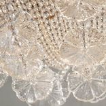 Clear crystals and blown glass daisies