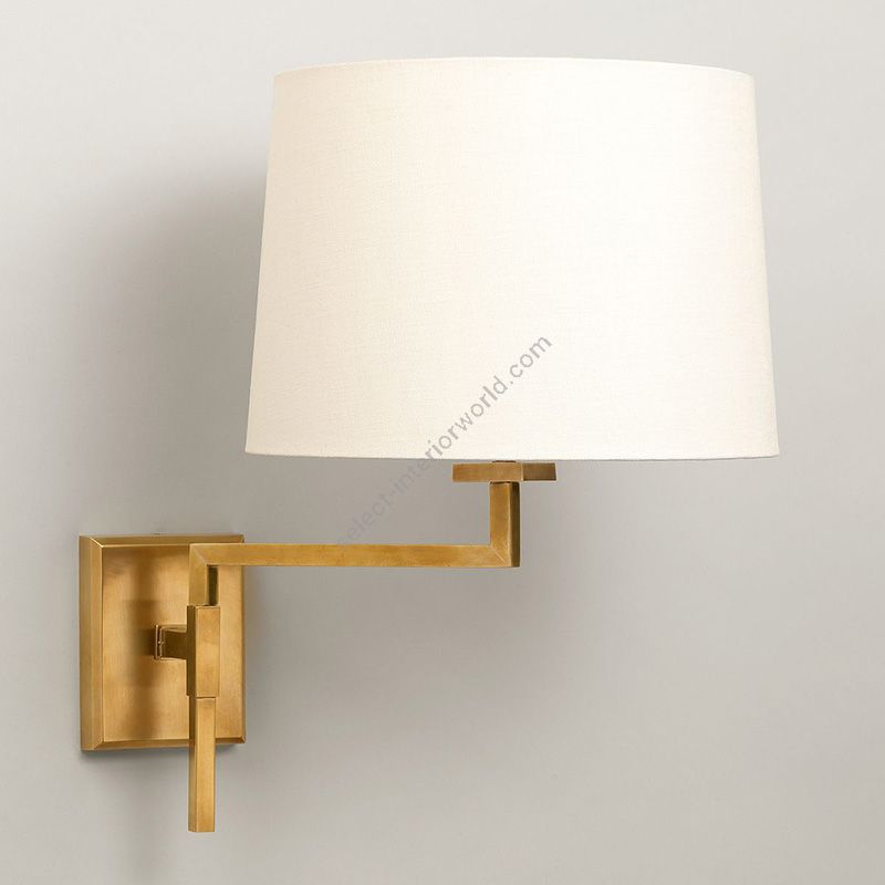 Swing arm wall light / Finish: Brass / Lampshade: Lily colour, material linen / Model: without rod